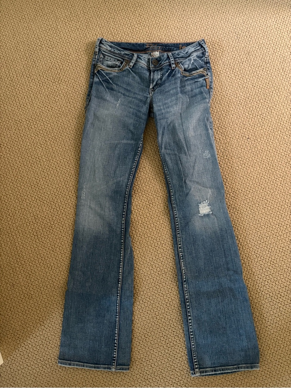 Silver Jeans Low Rise Flare Jeans with Light Distressing
